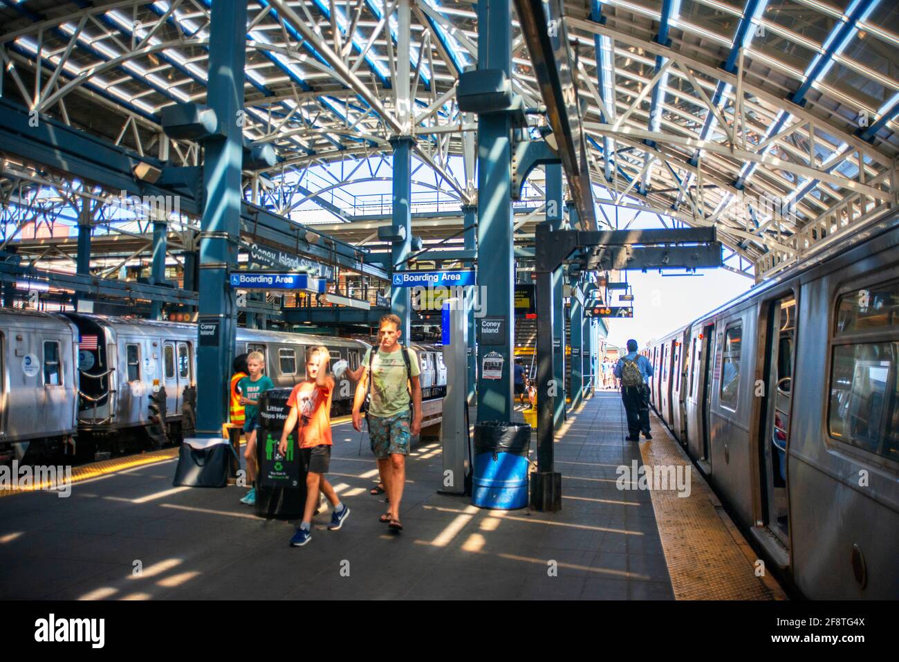 Q line train and platform on Coney Island subway station Brooklyn New York City. Stillwell Av