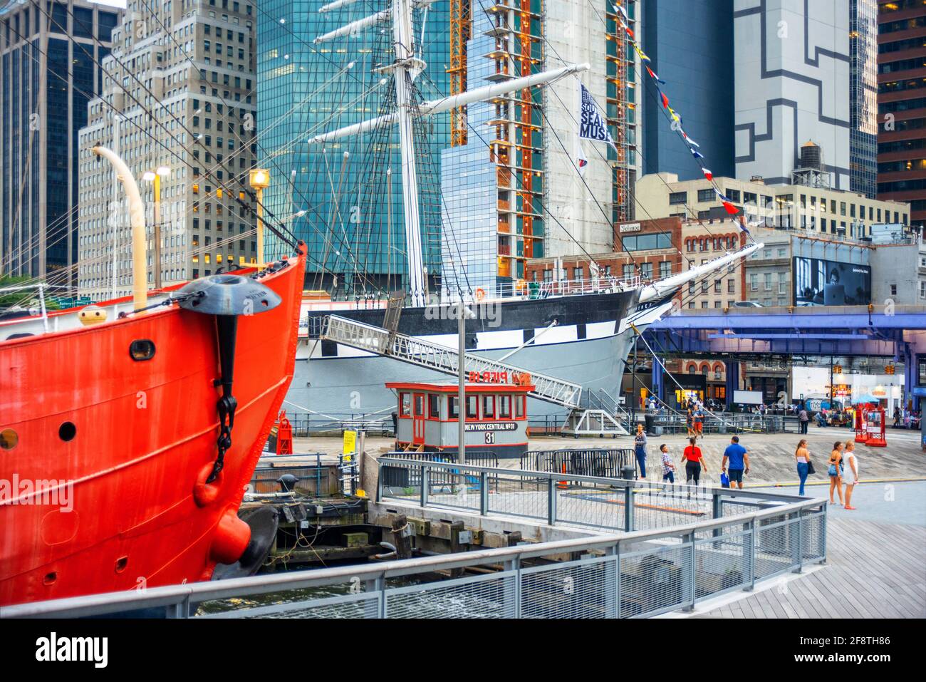 Pier 16 and Ambrose ship. Harbour South Street Seaport district, Lower Manhattan, New York City, NY, USA Stock Photo