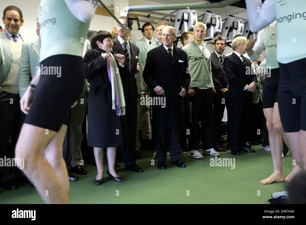 Pic shows The Duke of Edinburgh joking with the Cambridge University rowing team on Thursday morning at the launch of the boat they will man in the 2009 University Boat Race.  The Duke of Edinburgh today carried out three engagements in three hours after recovering from a back injury.  He had been unable to carry out engagements since Christmas after damaging his back while carriage driving.  But the Duke, 87, made up for lost time during a visit to Cambridge to celebrate Cambridge University's 800th anniversary.  At 9.15am he met Cambridge University rowers after launching the boat which they Stock Photo