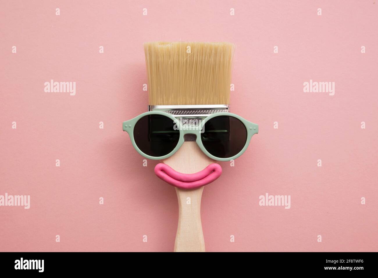 Paint brush diy character with sunglasses and smile Stock Photo