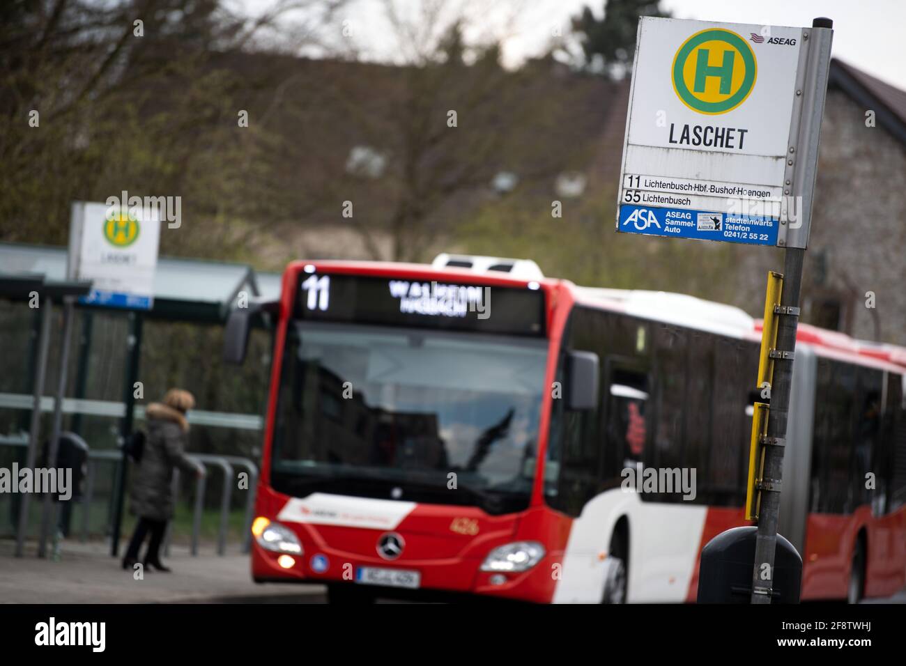 Oberforstbach, Germany. 15th Apr, 2021. A bus stops at the Laschet bus stop. The CDU party leader of the same name and North Rhine-Westphalian Prime Minister Armin Laschet and his CSU counterpart Söder are engaged in a power struggle for the chancellorship of the Union parties. Credit: Federico Gambarini/dpa/Alamy Live News Stock Photo