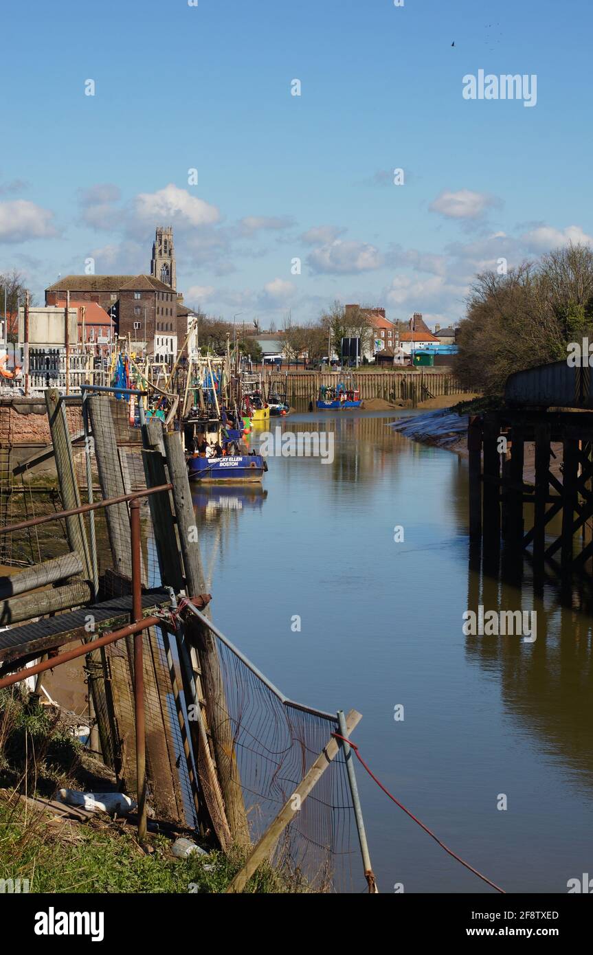 The River Haven on a sunny day with fishing boats and the Stump in the background. Stock Photo