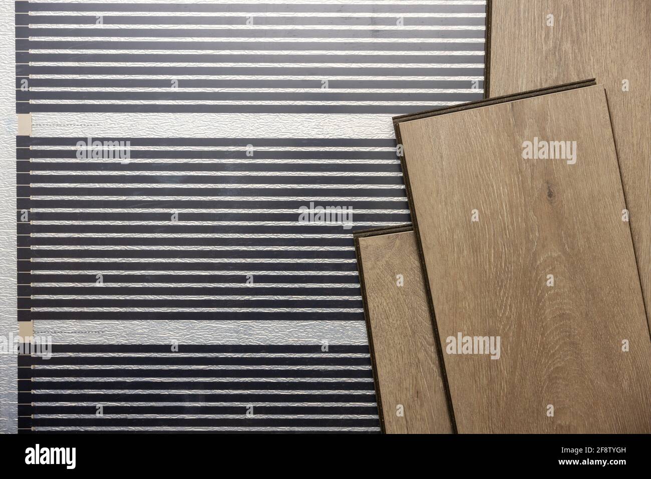 electric infrared heating film installation under laminate floor Stock Photo Alamy