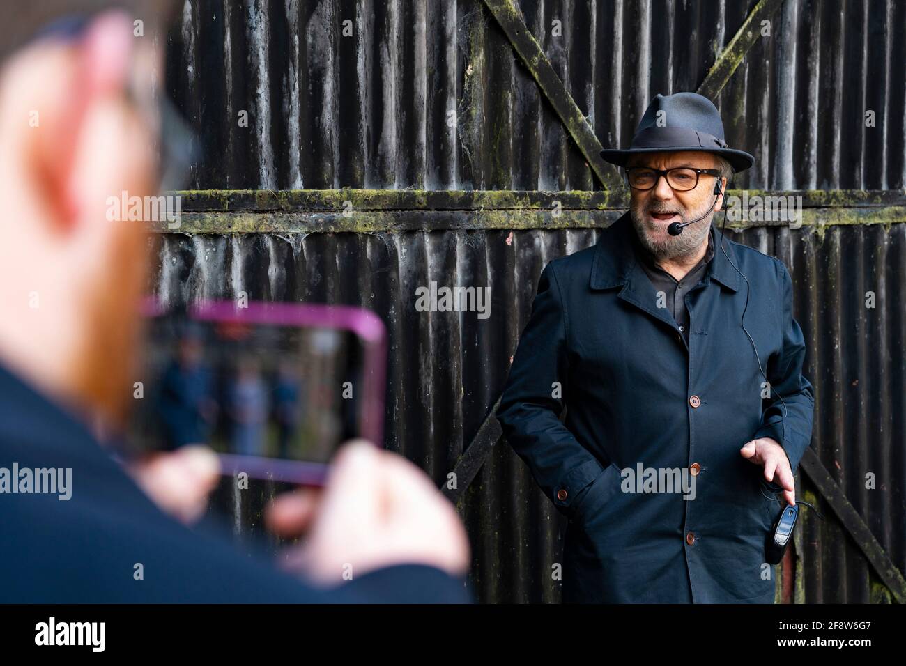 Lanark, Scotland, UK. 15 April 2021. George Galloway and candidates for the All for Unity party (formerly Alliance for Unity)  make live streamed campaign speeches ahead fo Scottish election at New Lanark conservation village in Lanark today.  Iain Masterton/Alamy Live News Stock Photo