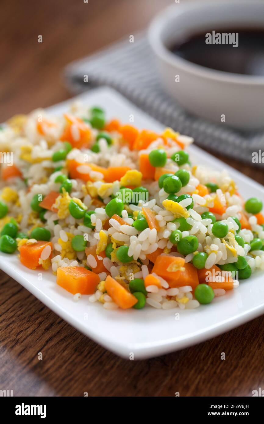 Oriental cantonese rice. Basmati rice with green peas, eggs and carrots