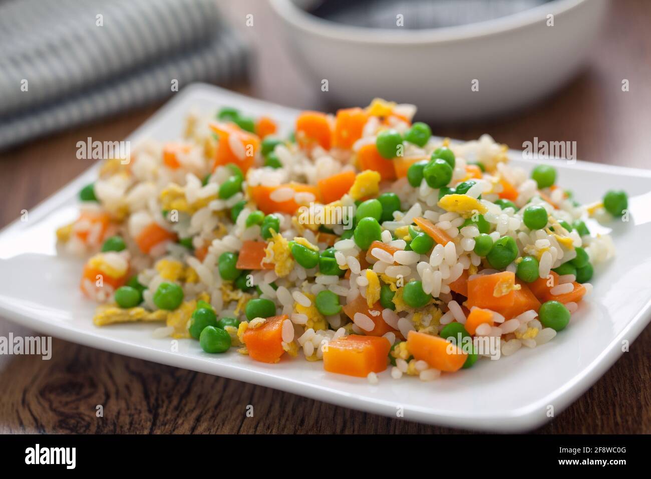Oriental cantonese rice. Basmati rice with green peas, eggs and carrots