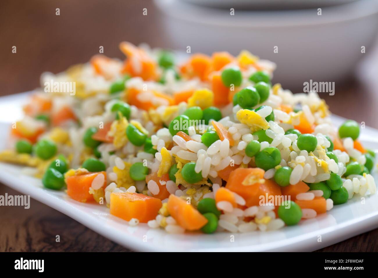 Oriental cantonese rice. Basmati rice with green peas, eggs and carrots
