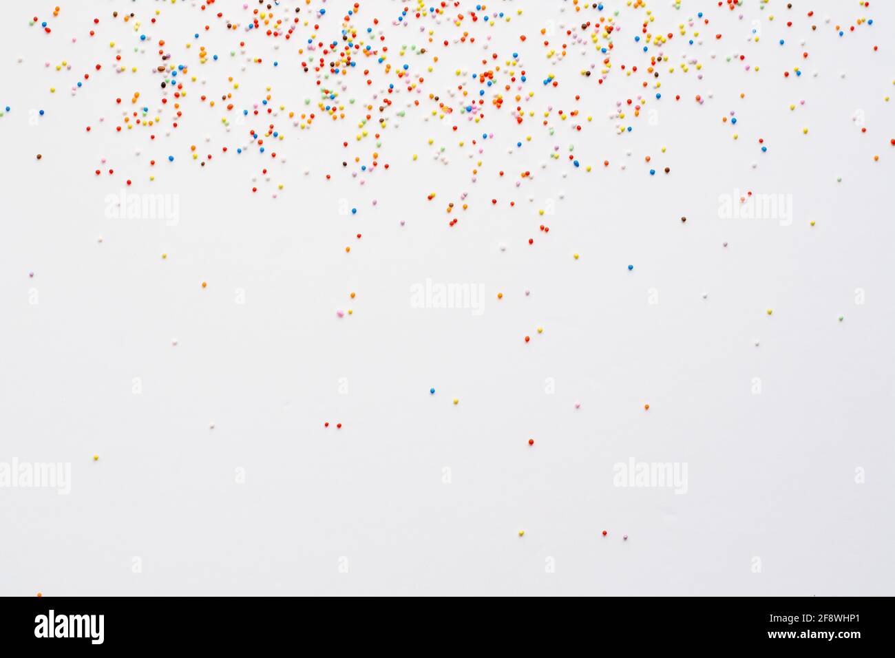 Top view of colorful candies isolated on a white background Stock Photo ...
