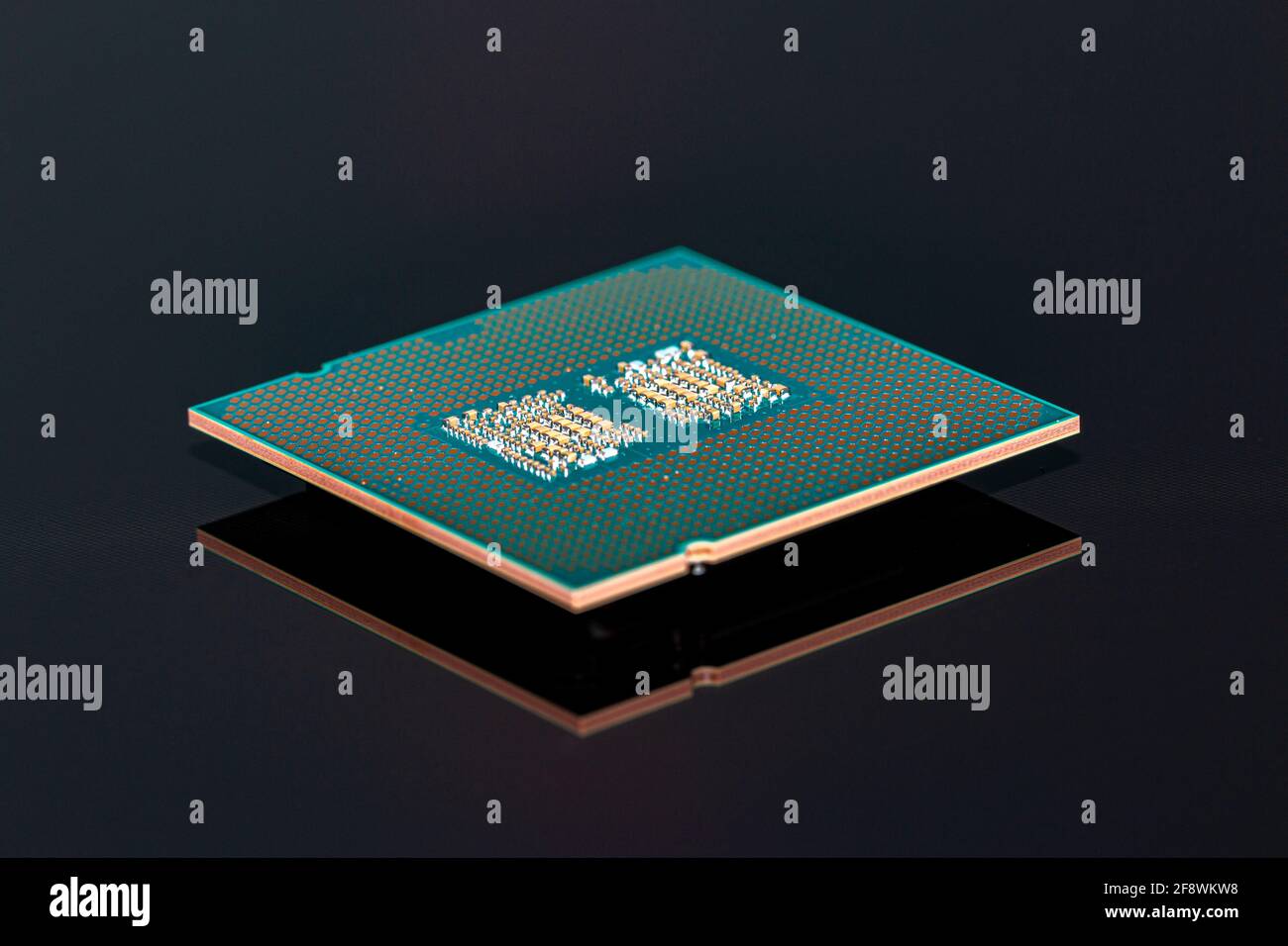A current computer processor is reflected on a black background Stock Photo