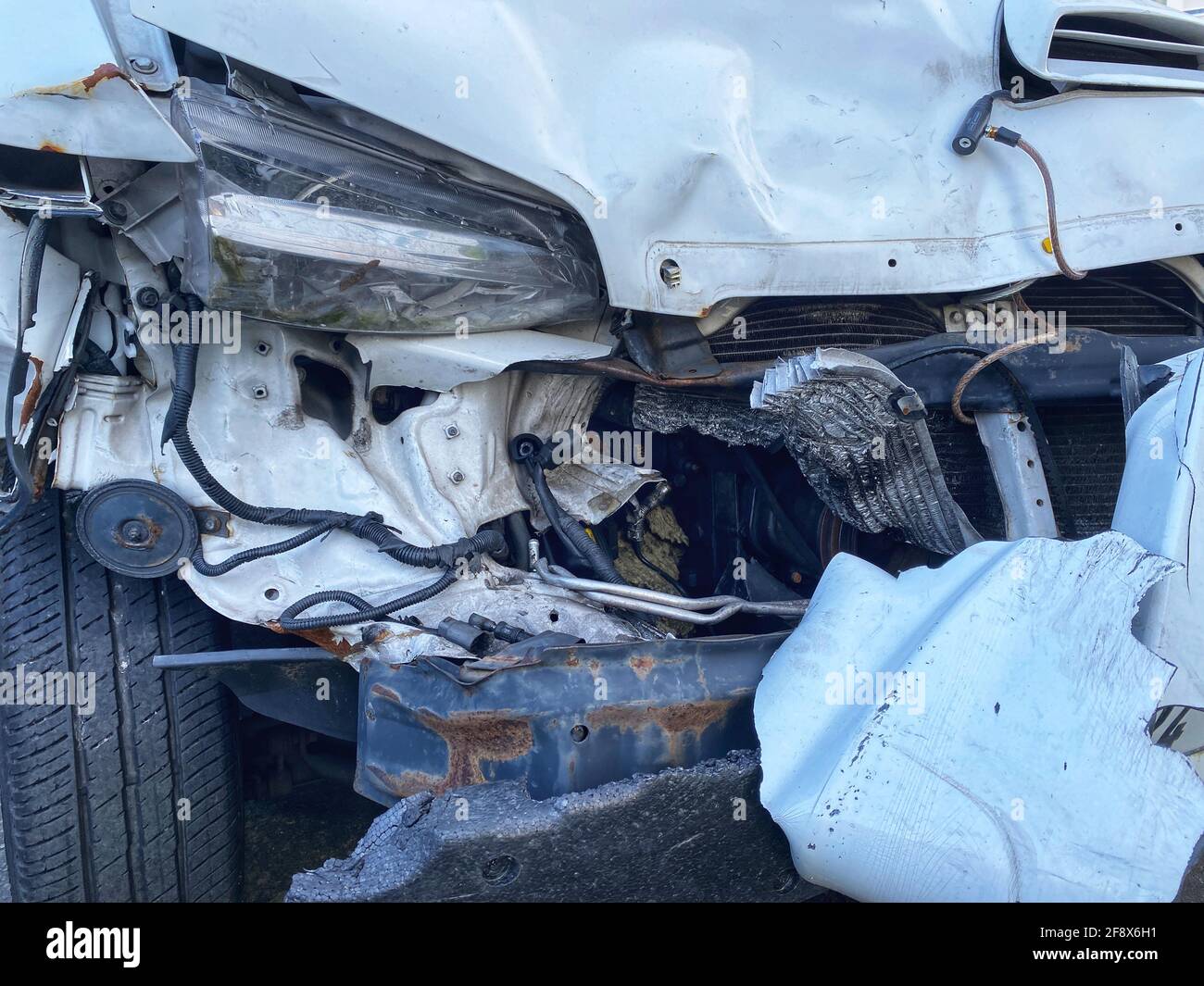 Van front damaged due to accident - Automotive insurance coverage, repair, garage concept Stock Photo