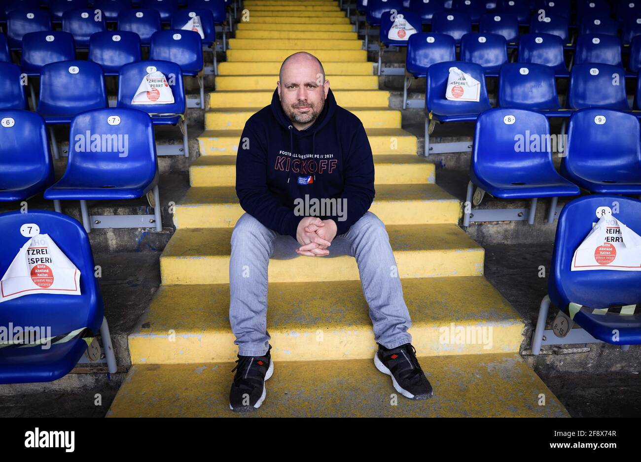 Hamburg, Germany. 15th Apr, 2021. Max Paatz, General Manager Hamburg Sea  Devils in the European League of Football (EFL), sits in the stands at the  Hoheluft stadium during a photo session. The