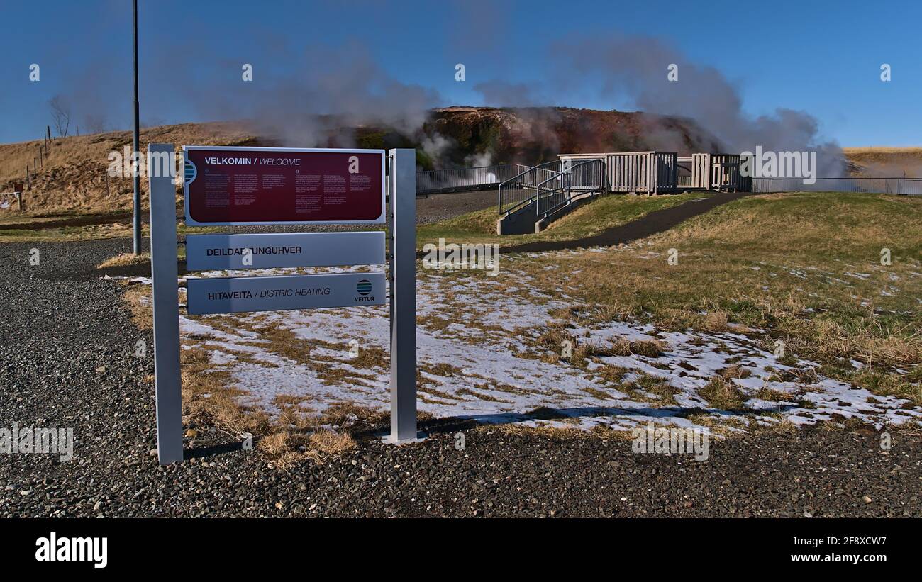 Information sign at Deildartunguhver hot springs in Reykholt in Borgarbyggð community in west Iceland with steaming hot water in winter season. Stock Photo