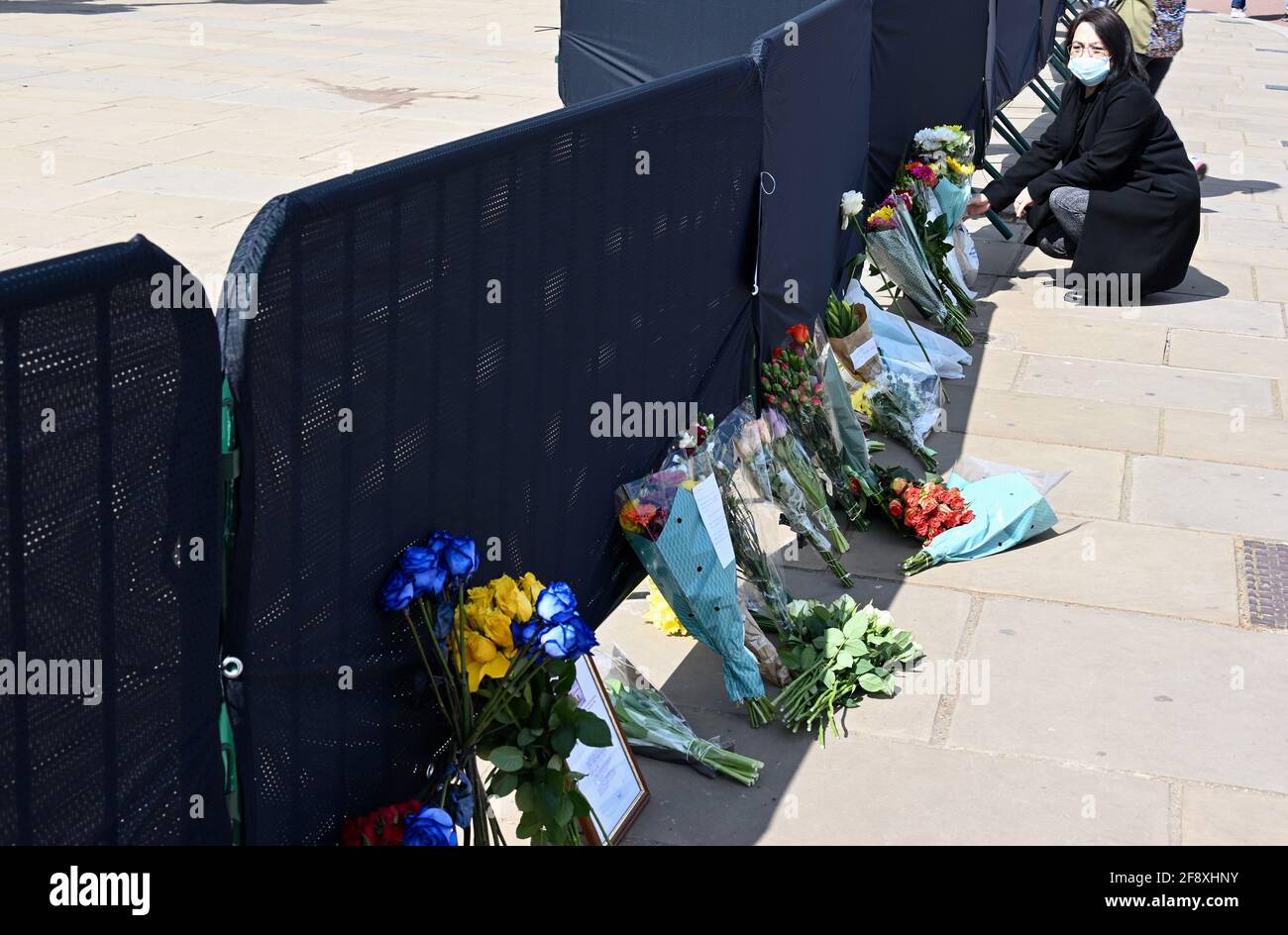 Royal well wishers left floral tributes for the Duke of Edinburgh following his death on 09.04.2021.Mourners were asked to stay away from the Royal Residences because of the Coronavirus Pandemic. Buckingham Palace, London. UK Stock Photo