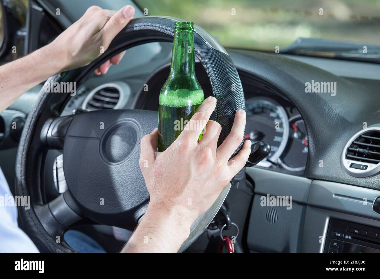 Driver with problems of alcohol addiction Stock Photo - Alamy