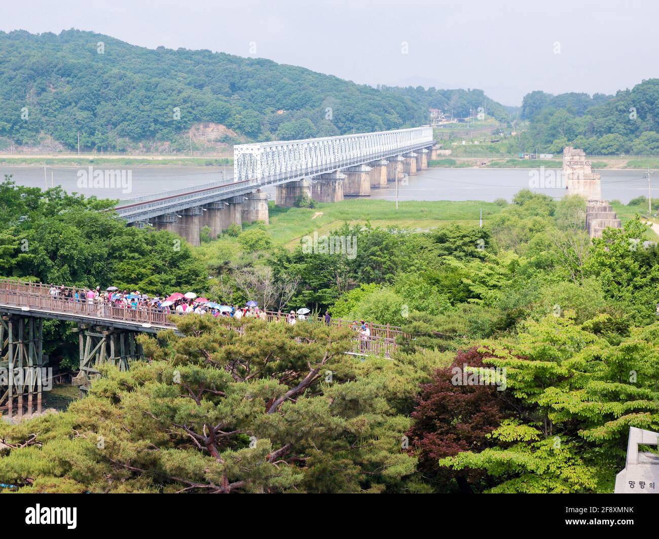 Tourists view the famous Freedom railroad bridge in Imjingak. At the