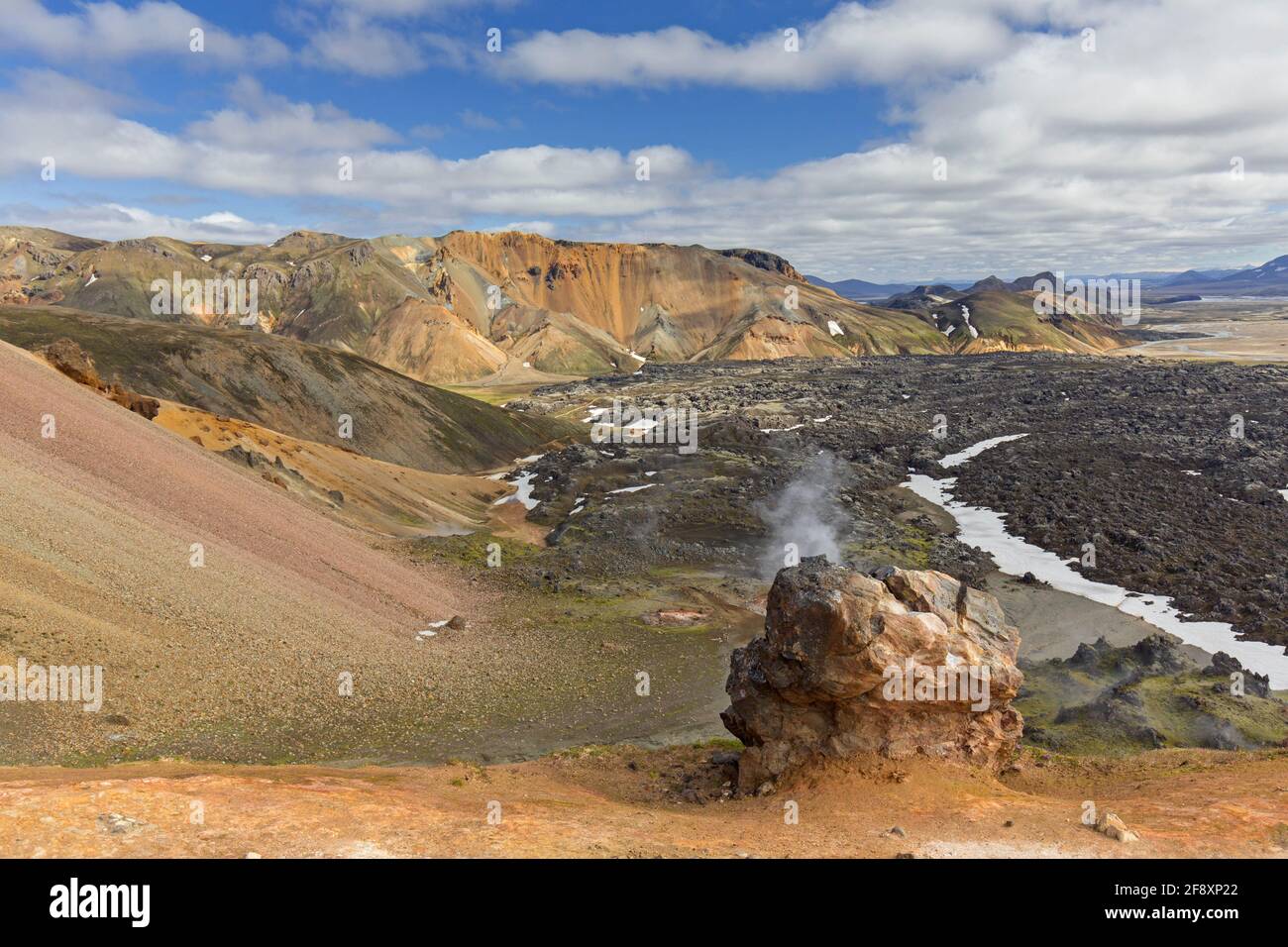 Steam from fumarole / solfatara at rhyolite mountains at Brennisteinsalda volcano near Landmannalaugar, Fjallabak Nature Reserve, Sudurland, Iceland Stock Photo