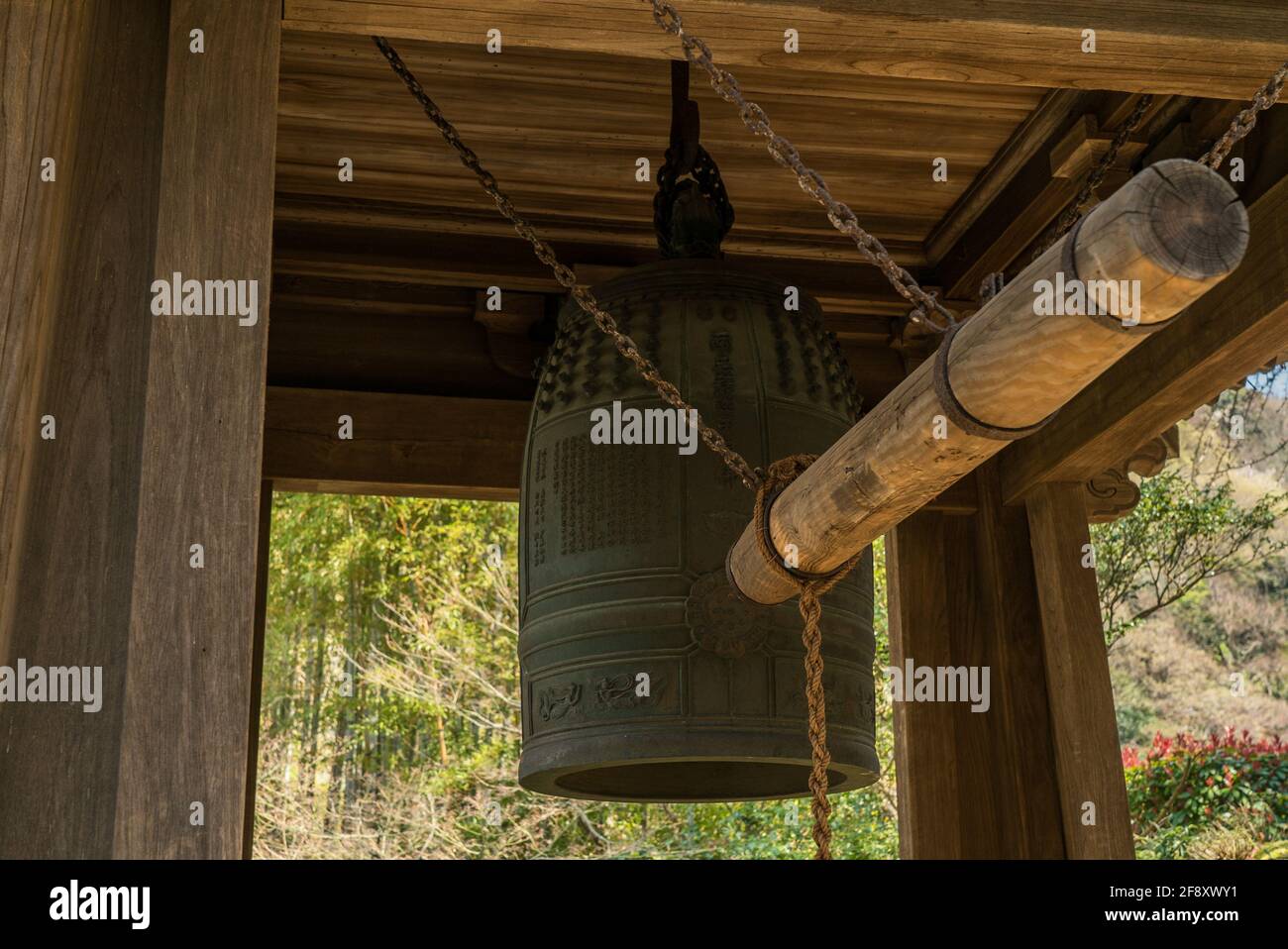 Huge Temple Bell in Hokoku-ji Buddhist Temple in Kamakura, Japan. Known as the 'bamboo temple'. Buddhism gong. Stock Photo