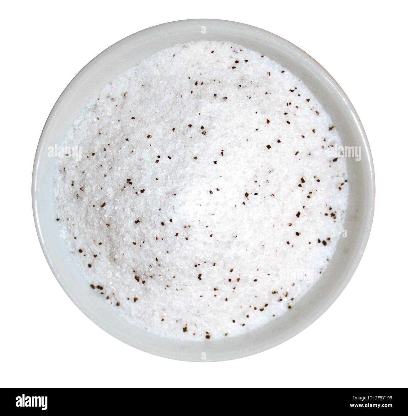 A Bowl of Sea Salt with Small Black Truffle Pieces Stock Photo