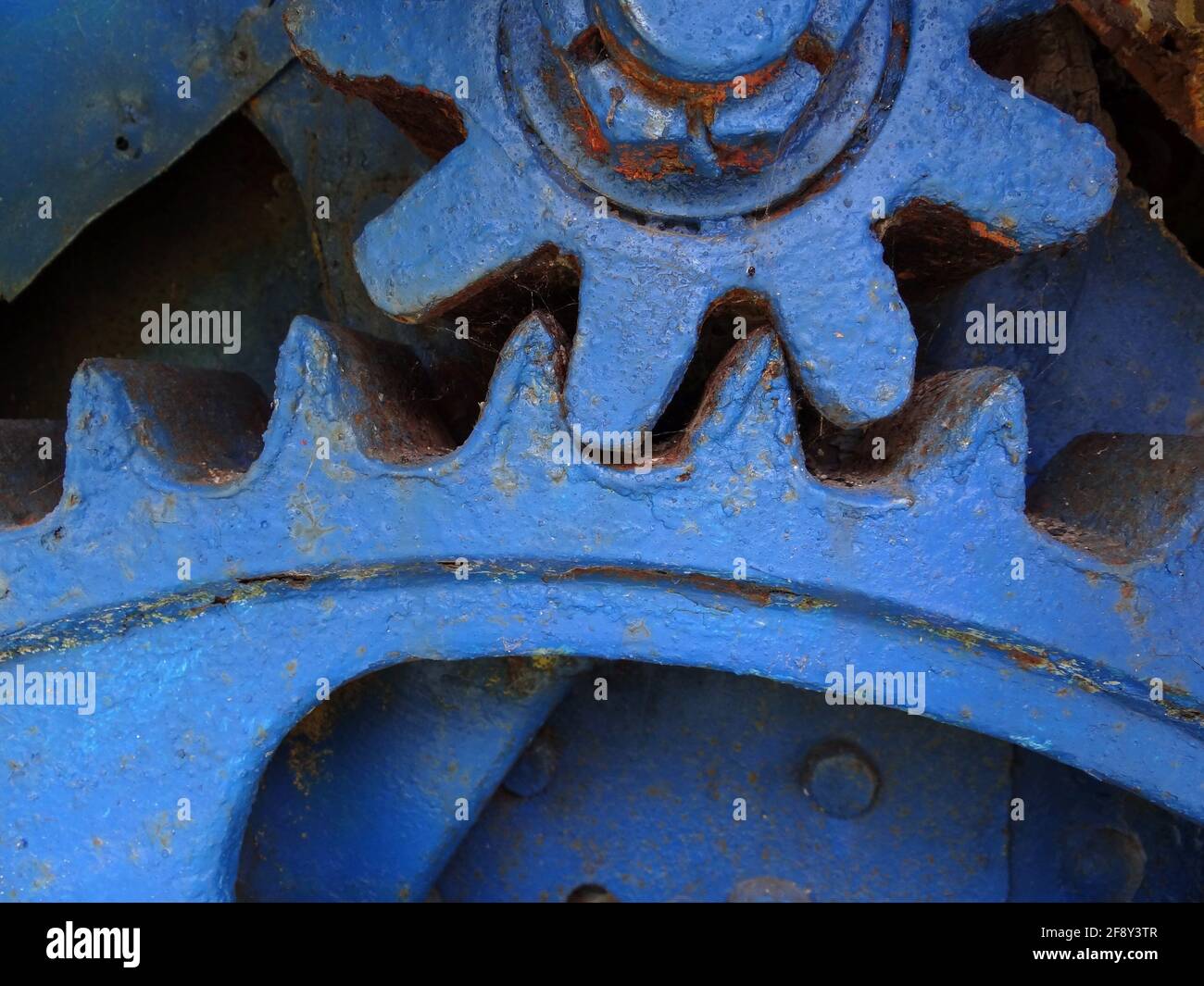 Colorful gear wheels close up mechanical parts Stock Photo