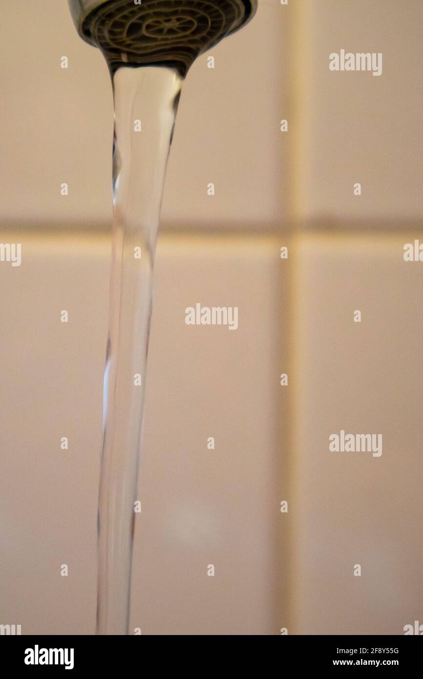 Cape Town, South Africa 06042021 Close up of water flowing out of