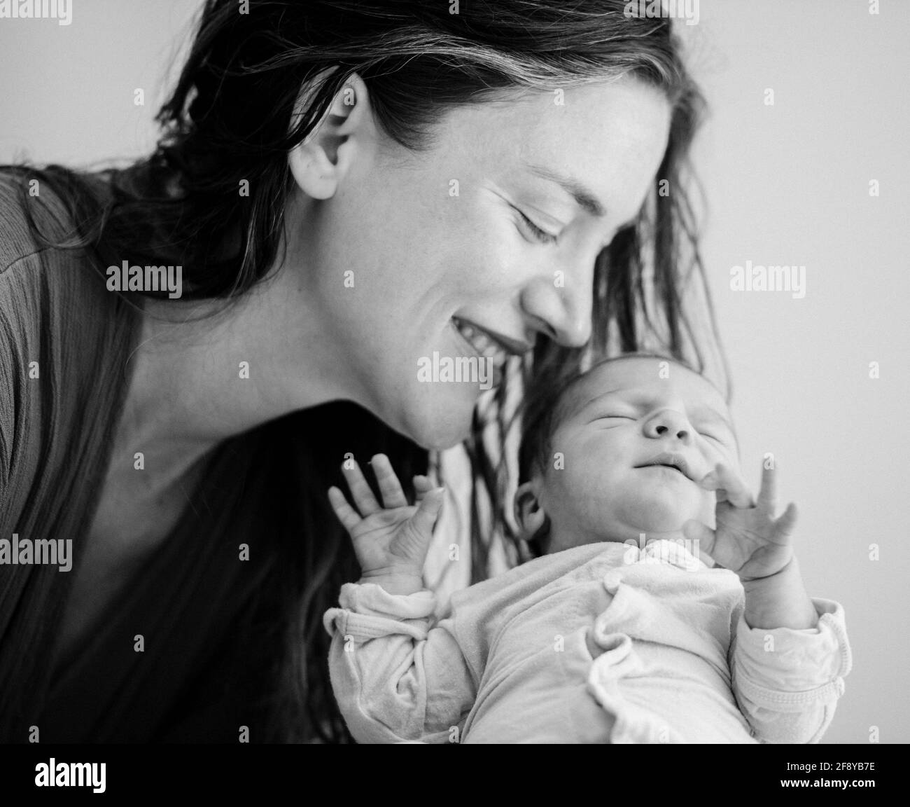 Portrait of mother with newborn baby Stock Photo