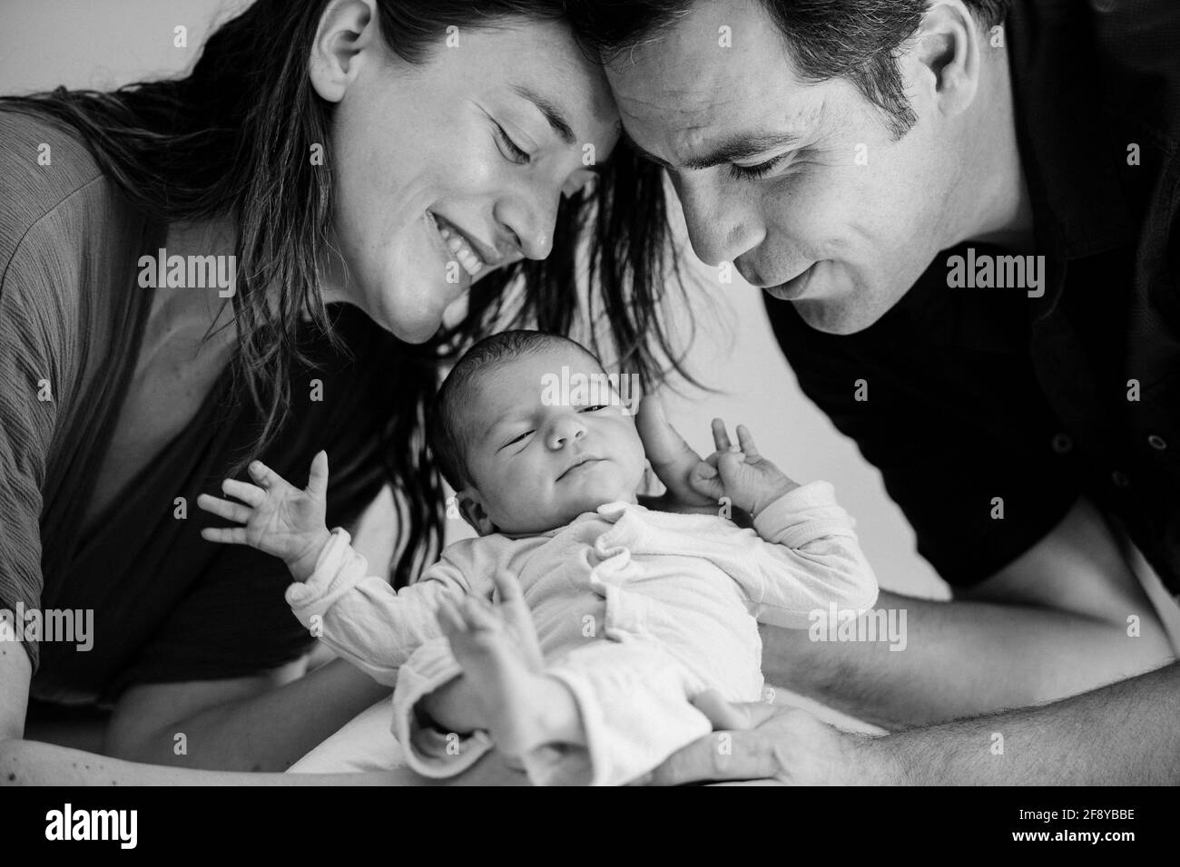 Portrait of parents with newborn baby Stock Photo