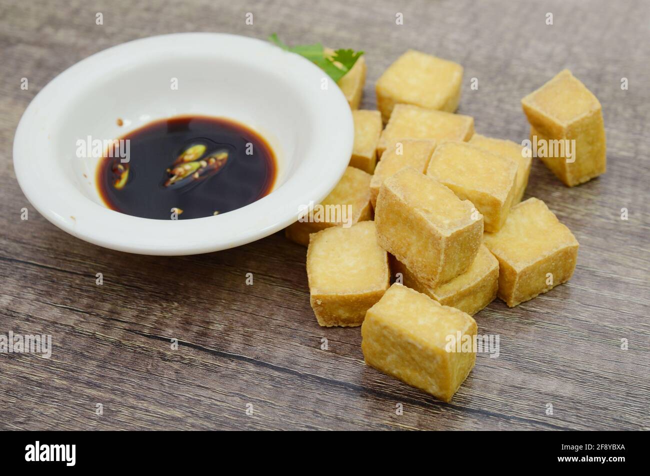 Fried Tofu with Sweet Soy Sauce Stock Photo - Alamy