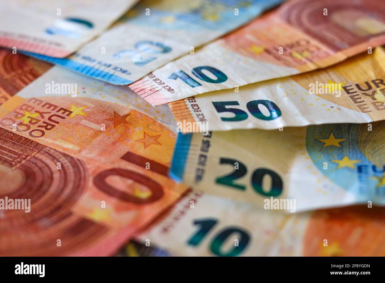 Euro banknotes. table covered with banknotes. Stock Photo