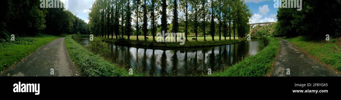 360-degree view of green landscape with Rance River, trees and footpath, France Stock Photo