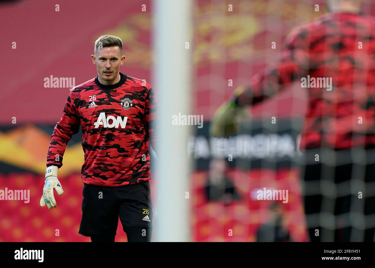 Manchester, UK. 15th Apr, 2021. Dean Henderson of Manchester United named on the bench warms up before the UEFA Europa League match at Old Trafford, Manchester. Picture credit should read: Andrew Yates/Sportimage Credit: Sportimage/Alamy Live News Stock Photo