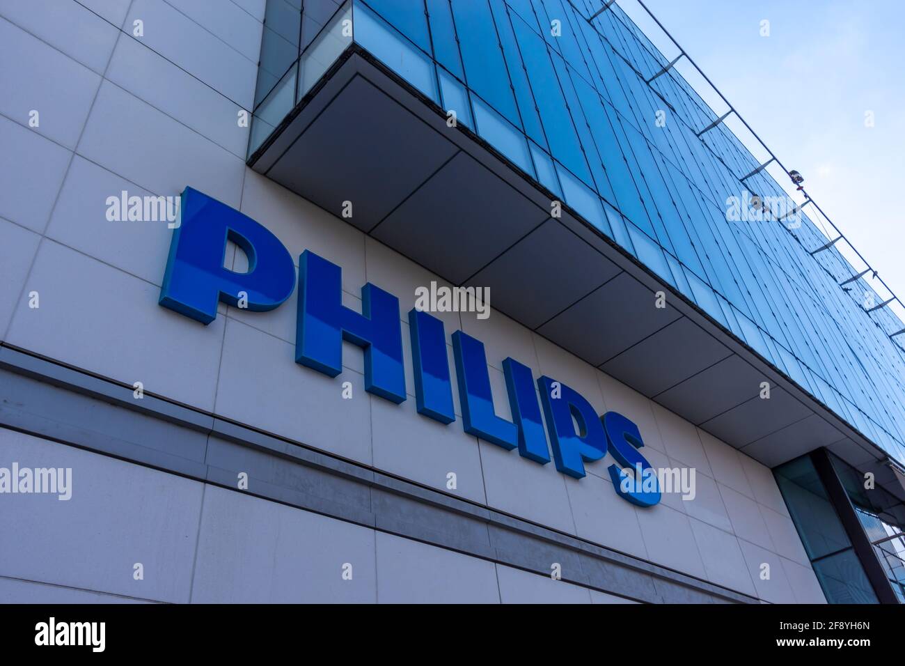 Logo on the facade of the French headquarters of Philips, a Dutch group specializing in household appliances, medical equipment and lighting Stock Photo