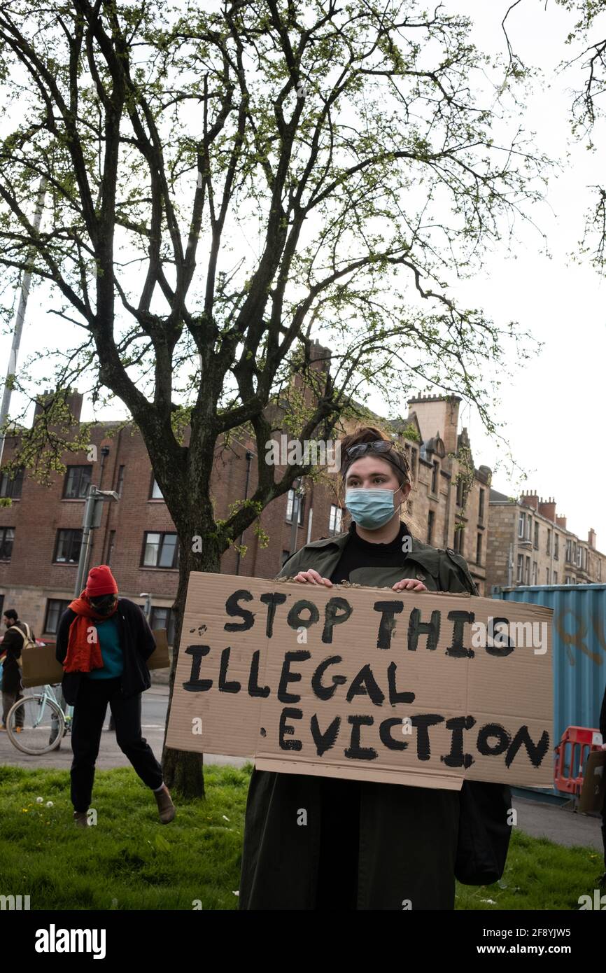 Glasgow, UK, 15th April 2021. Demonstration by Living Rent Glasgow as a show of strength and supporter for a local resident (a mother with children) in Govanhill district who is facing an illegal eviction by her landlord one week from now, in spite of the 6 month minimum notice which is required by law when evicting a tenant under a Private Residential Tenancy Agreement for the sale of a rented property (Schedule 1 of the Coronavirus Scotland Act 2020). Photo credit: Jeremy Sutton-Hibbert/ Alamy Live News. Stock Photo