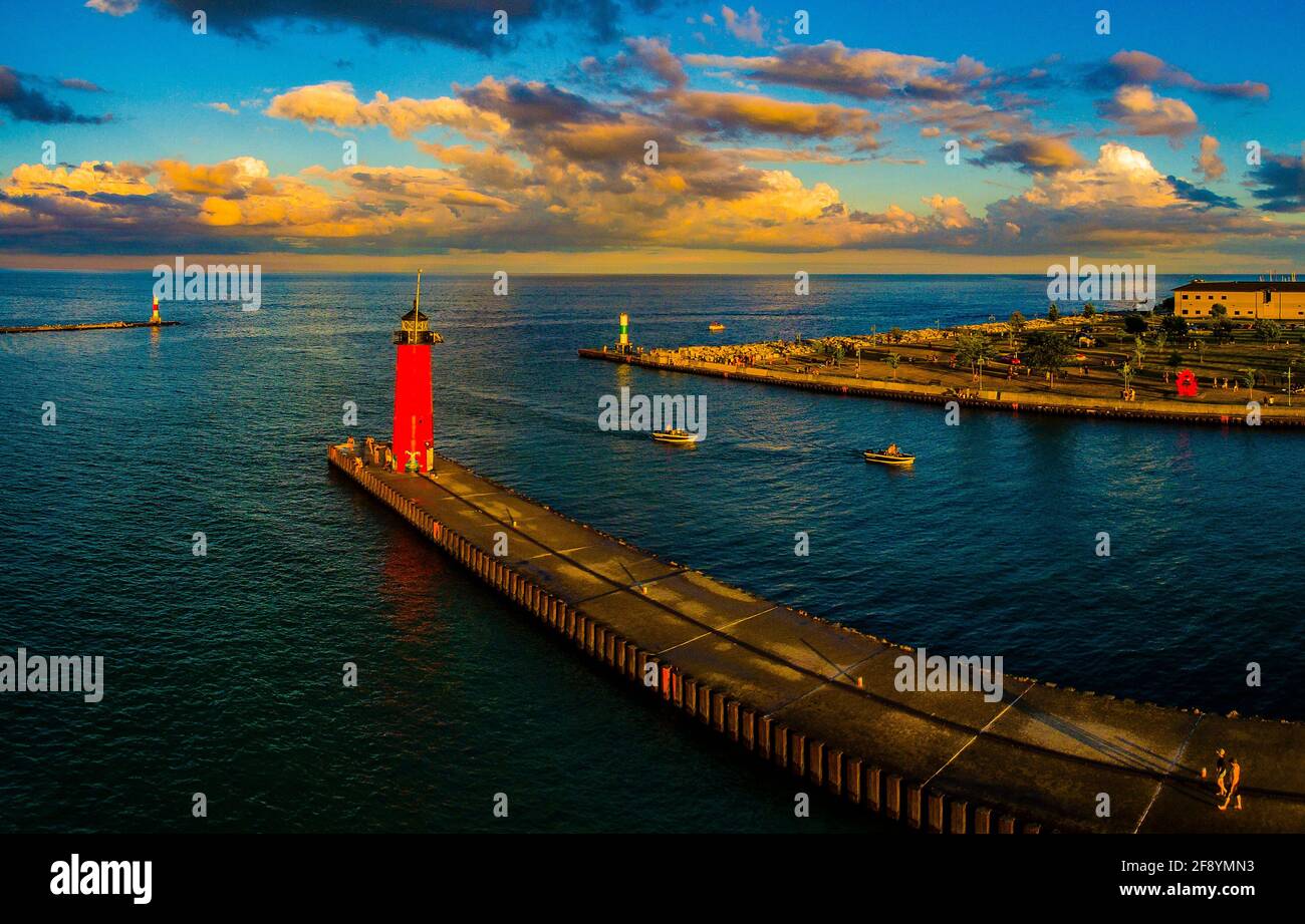 Lighthouse and yacht in pier at evening, Kenosha, Wisconsin, USA Stock Photo