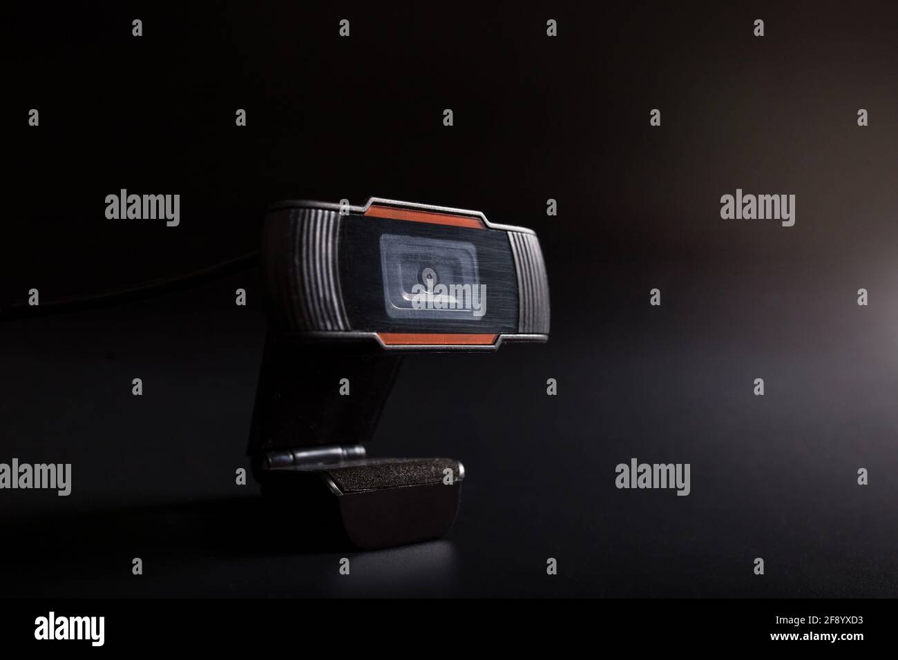 Black webn video camera on black background with copy space Stock Photo