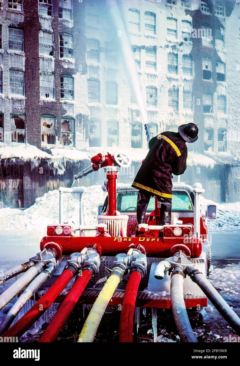 Firefighter in city in winter Stock Photo