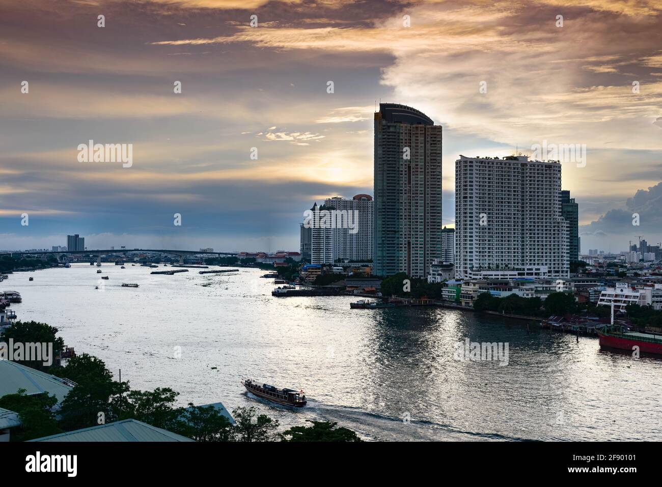 Commercial buildings across River Phraya, evening in Bangkok Stock ...