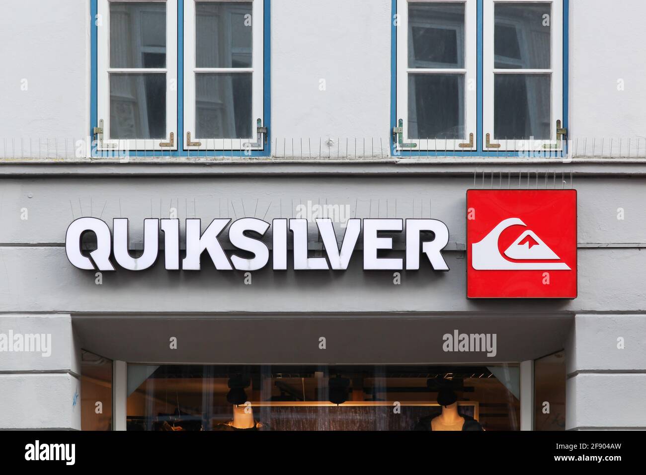 Flensburg, Germany - December 14, 2017: Quiksilver sign on a wall. Quiksilver is a brand of surf-inspired apparel and accessories Stock Photo