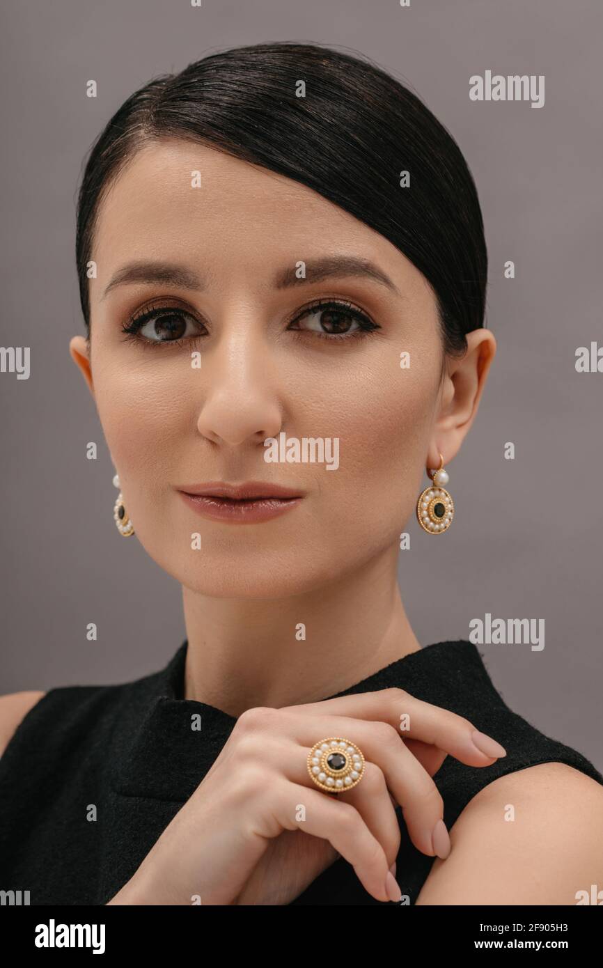 Portrait of a beautiful woman wearing jewellery set Stock Photo