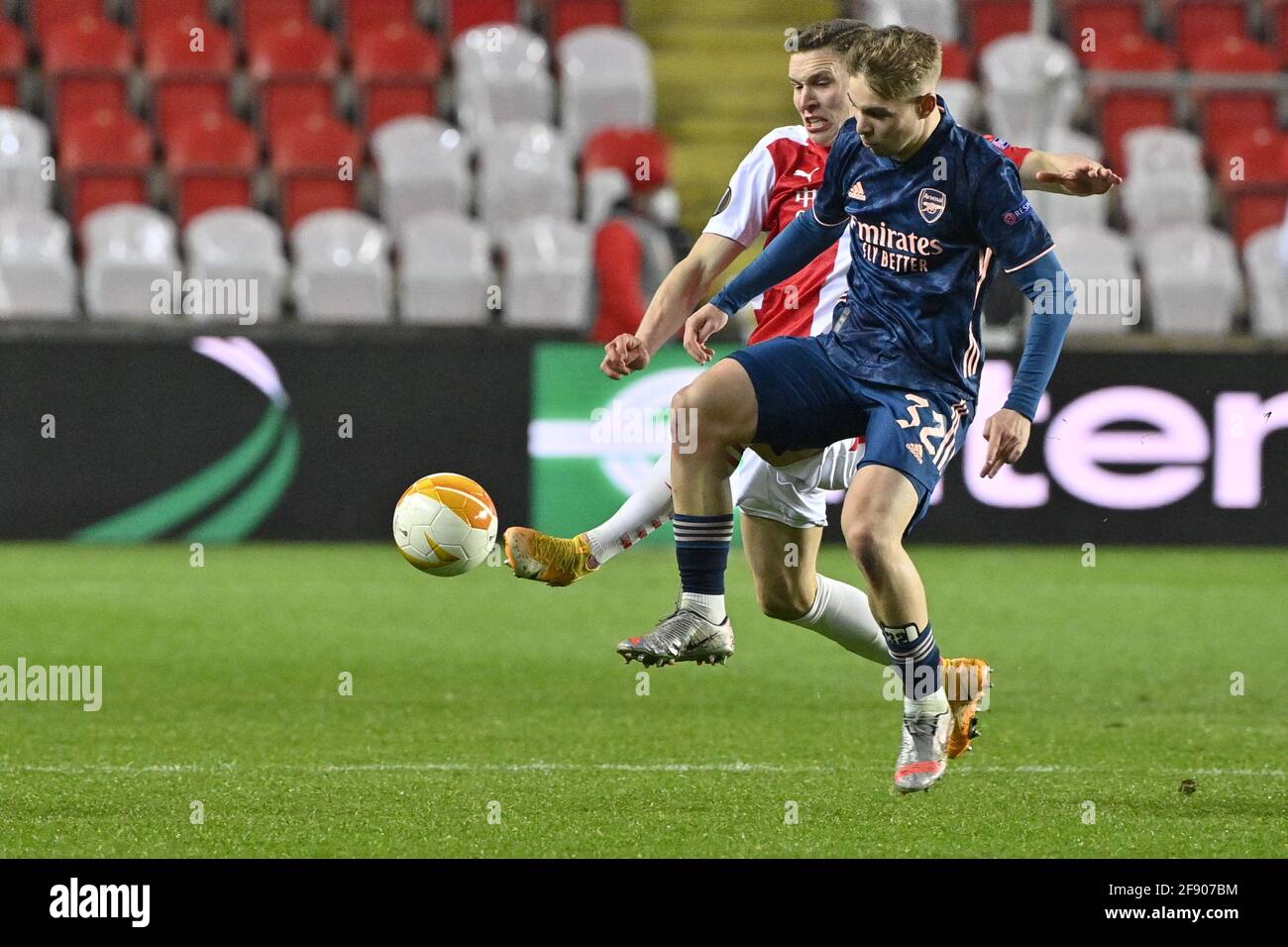 Prague, Cr. 15th Apr, 2021. From left Lukas Provod of Slavia and Emile Smith Rowe of Arsenal in action during the FC European Football League quarterfinal match SK Slavia Prague vs Arsenal in Prague, Czech Republic, April 15, 2021. Credit: Vit Simanek/CTK Photo/Alamy Live News Stock Photo