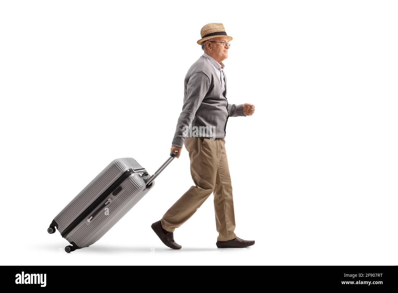 Man dragging bag hi-res stock photography and images - Alamy