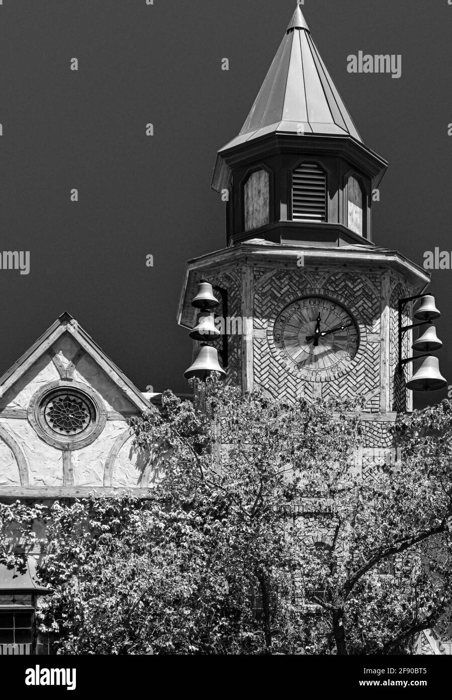 Architectural details of whimsey and texture in black and white of the Old Mill House Clock Tower in Solvang, CA , USA Stock Photo