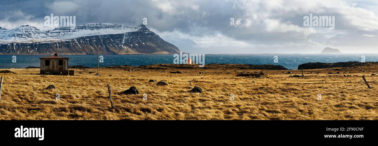 Brown barren landscape with coastline and hills, Iceland Stock Photo