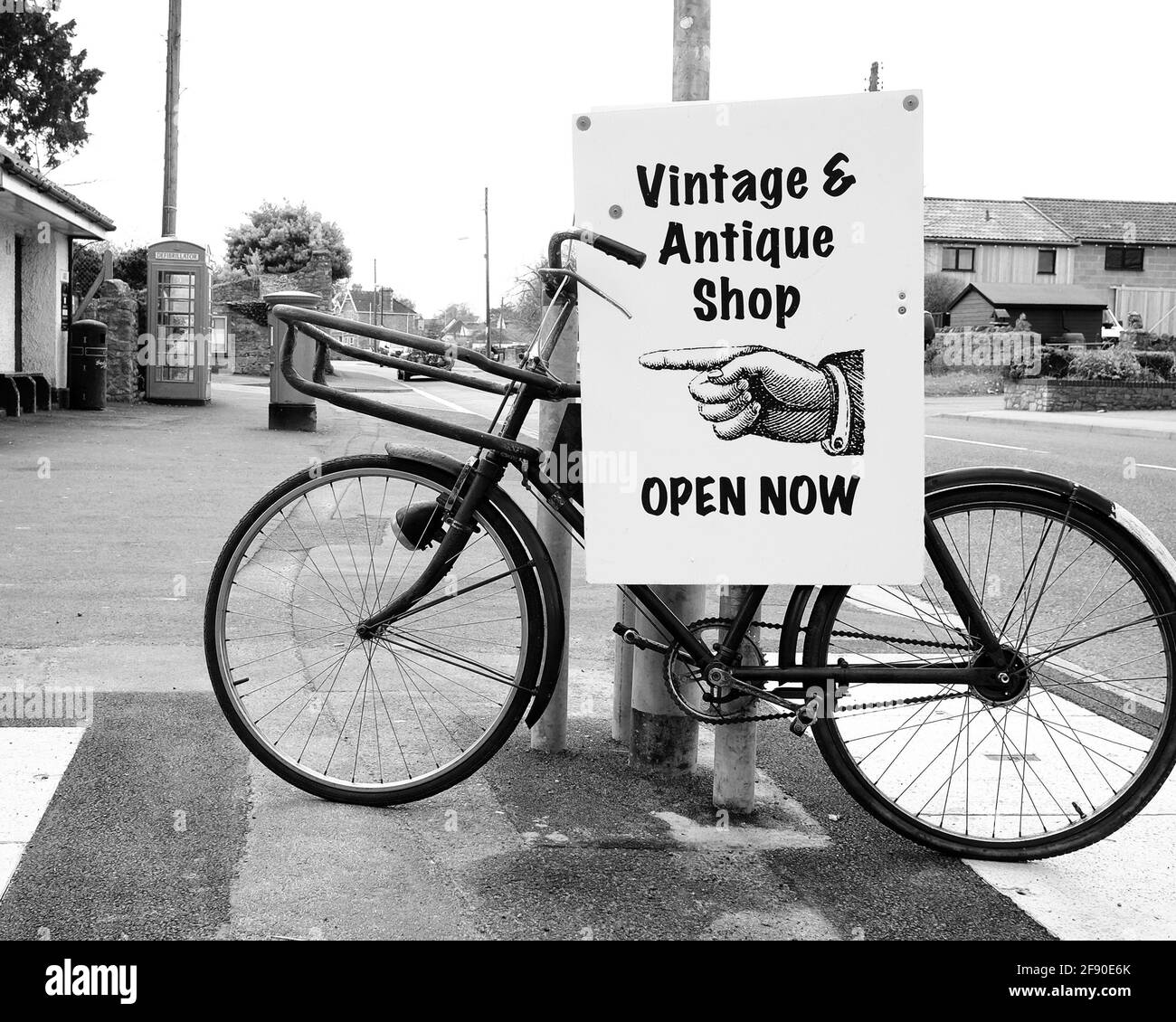 April 2021 - An old Pashley butchers bike used to advertise a Vintage & Antique shop in the Somerset village of Cheddar. Stock Photo