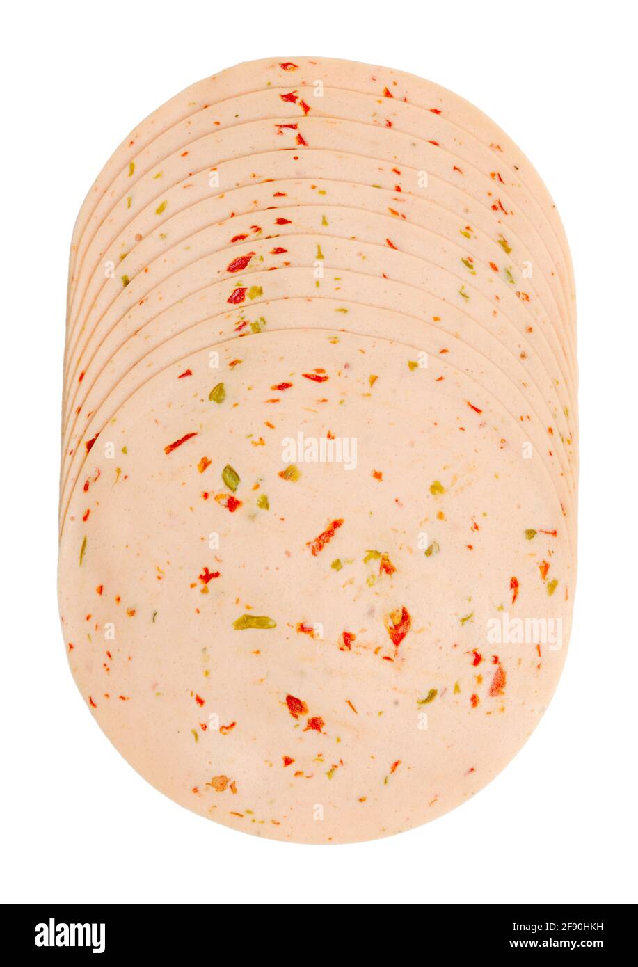 Cold cut vegetarian savory sausage, sliced and  placed on top of each other. Thin slices of spicy Extrawurst. Staple food. Isolated over white. Stock Photo