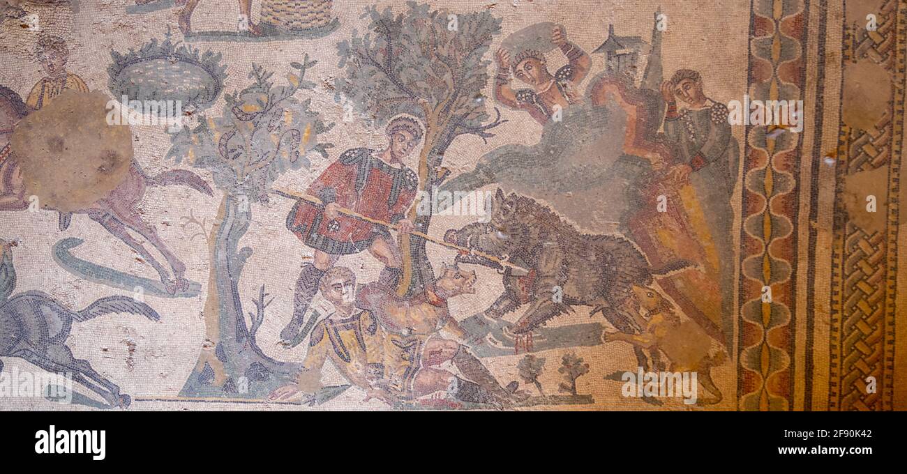 Wild boar hunt scene, detail of the Room of the Little Hunt mosaic, Villa Romana del Casale Stock Photo