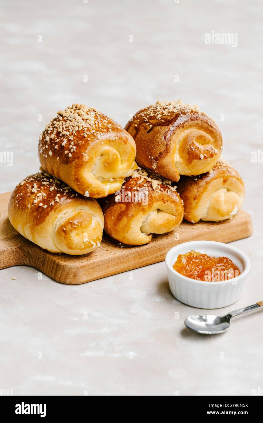 Vanilla buns with Seville orange marmalade and streusel Stock Photo