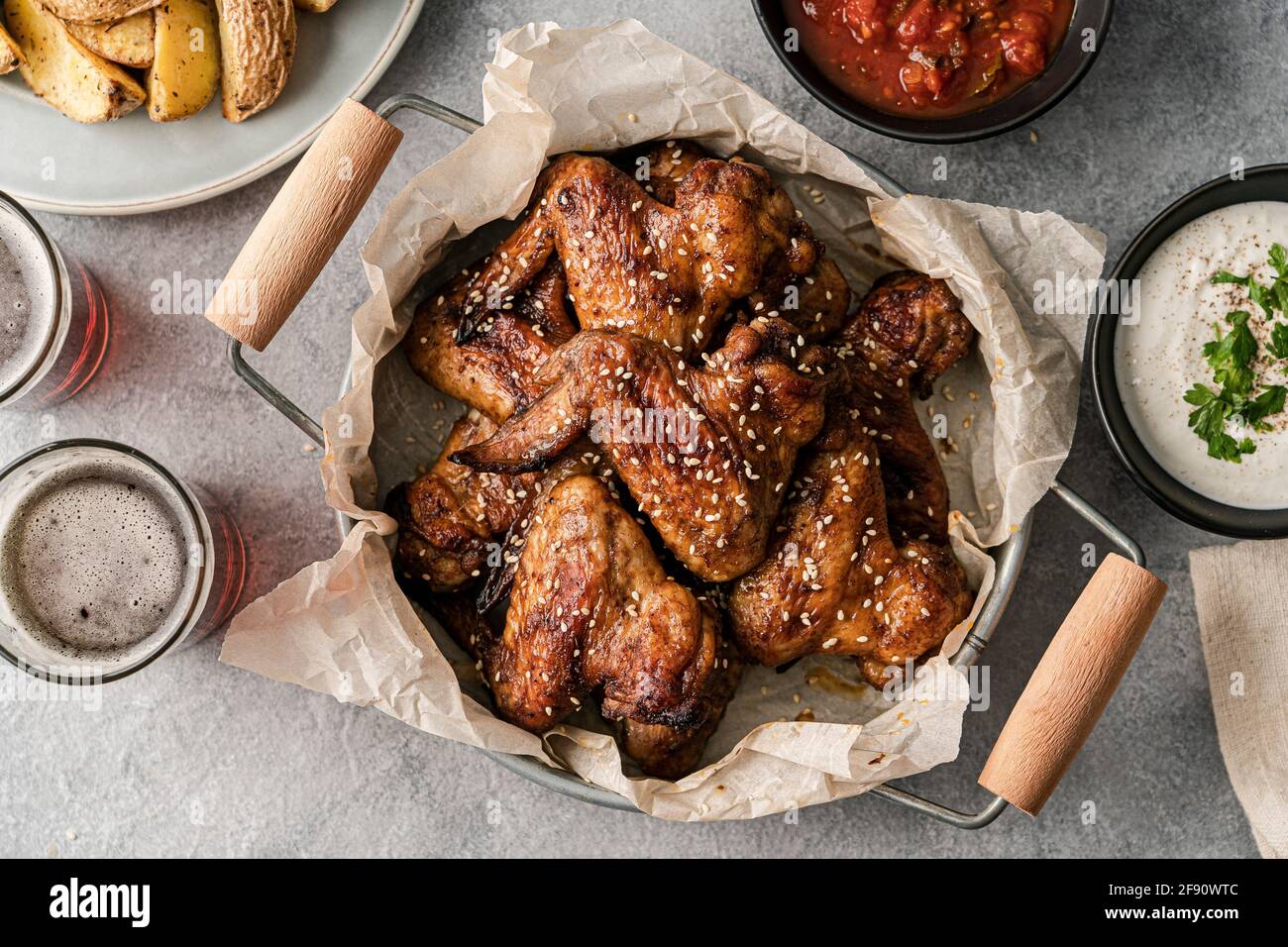Chicken wings served for a party Stock Photo - Alamy
