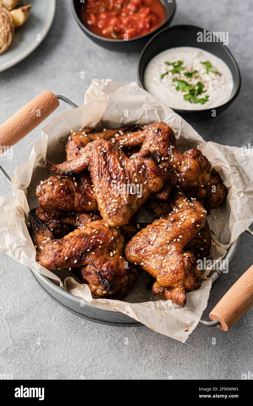 chicken wings served for a party Stock Photo - Alamy