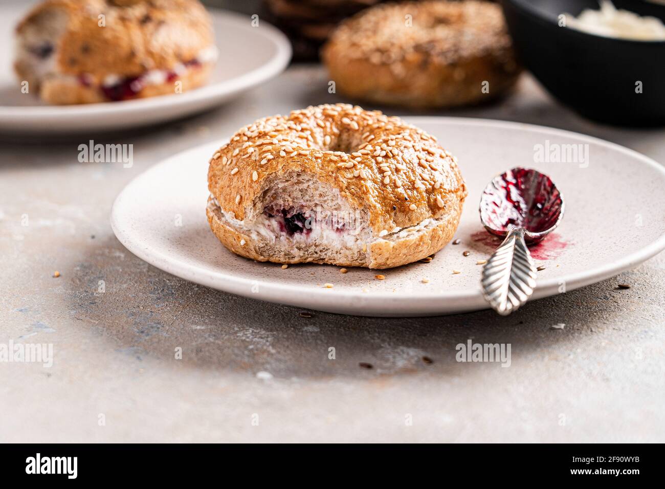 bagel with cream cheese and jam Stock Photo Alamy