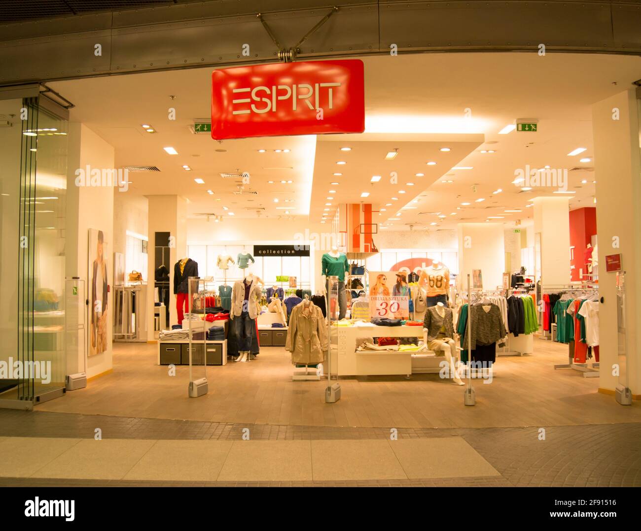 POZNAN, POLAND - Mar 11, 2013: A empty Esprit store in the late evening. This Esprit store is located in the shopping center Stary Browar. Stock Photo
